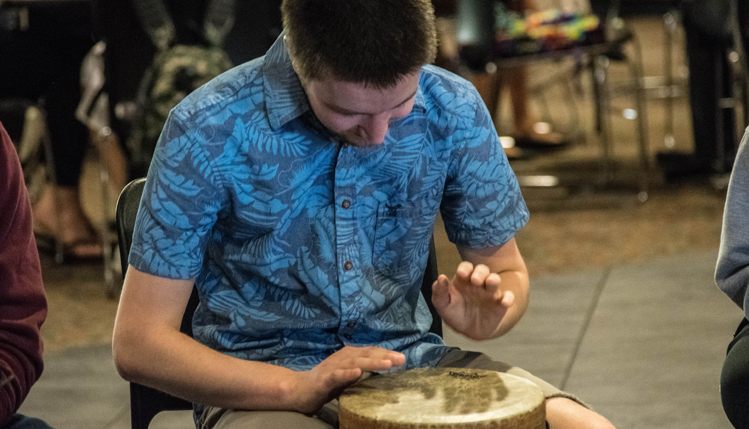 person playing bongo