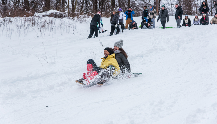 students sledding