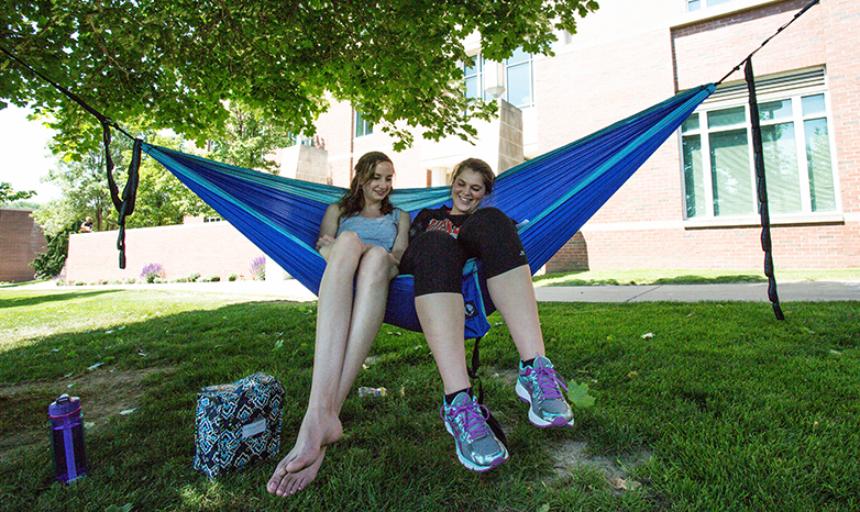 university students on hammock