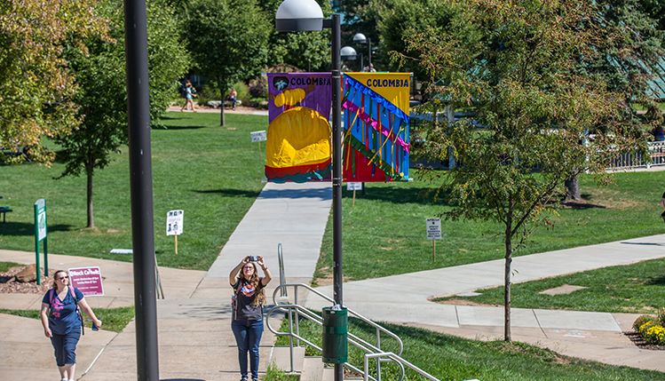 students creating fall art banners to be displayed on campus