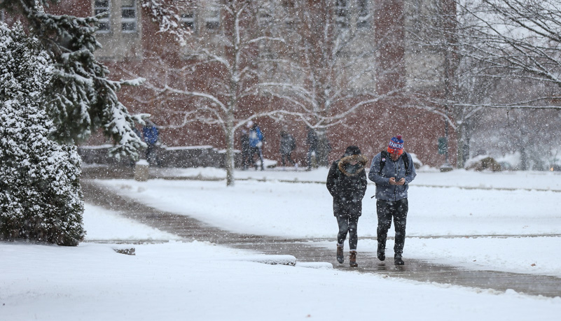 Students walking through the snow