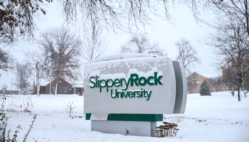 Campus sign in the snow