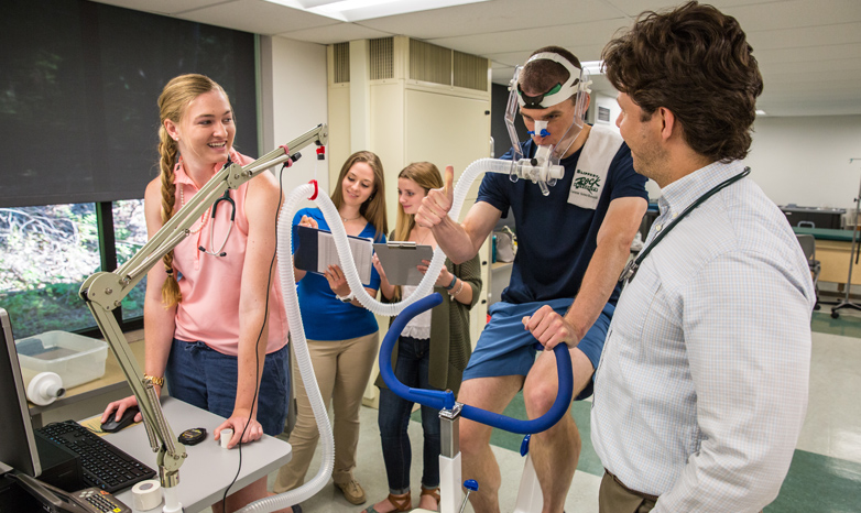 Exercise science majors record readings of research participant 
