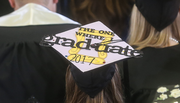 student decorated graduation mrtar board caps