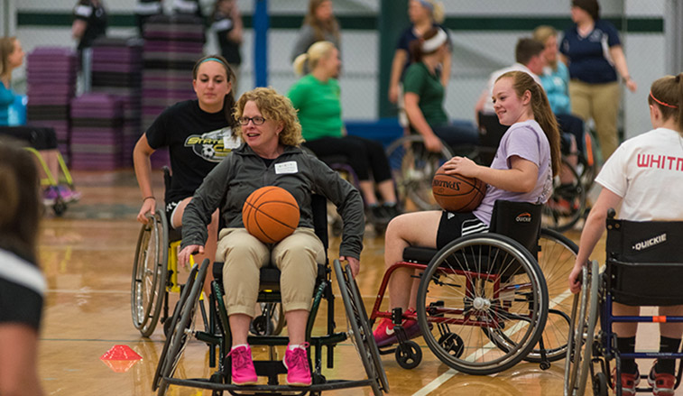 People playing wheelchair basketball