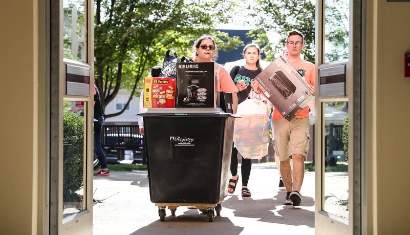Students helping with move in