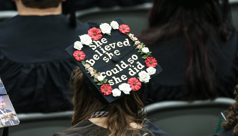 Cap that reads She believed she could so she did