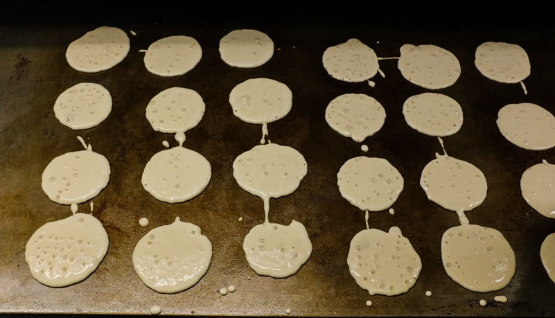 Cook making Pancakes