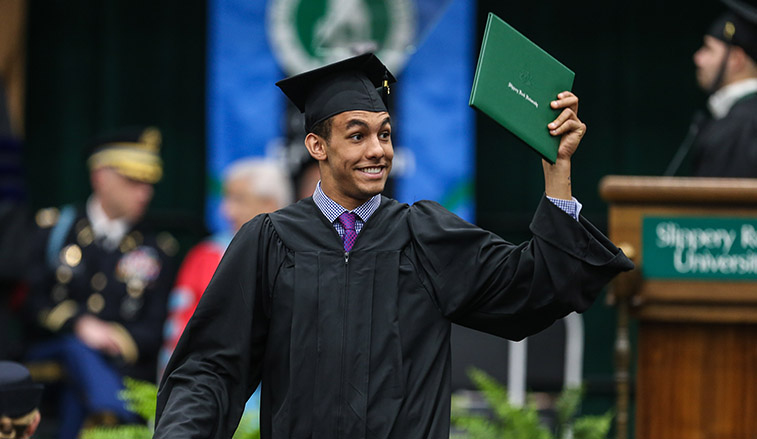 Graduate with his diploma