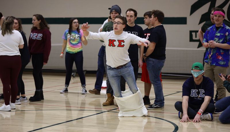 Kappa Sigma brother falling horribly during a sack race
