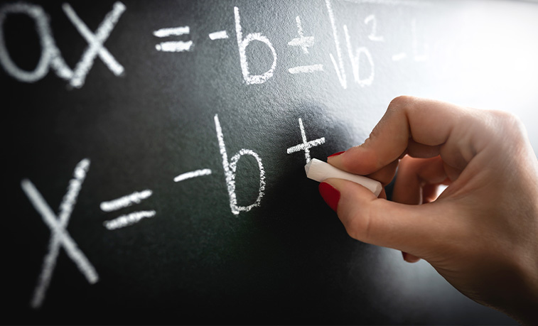Math problem on a chalkboard