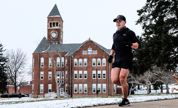 Troy running on campus