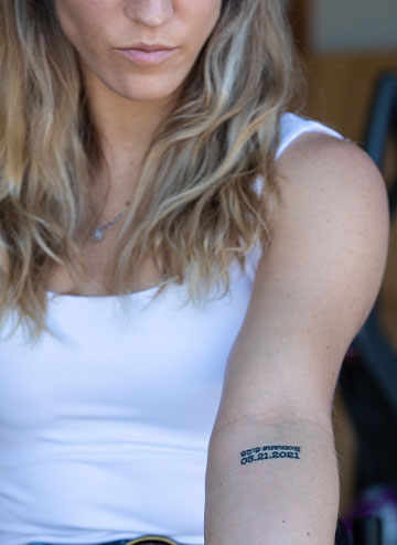 Roxanne's tattoo of the date of the crash