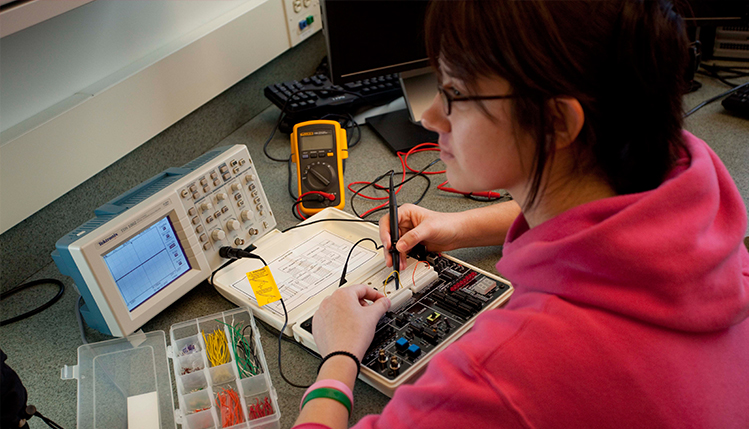 Student working on electronics 