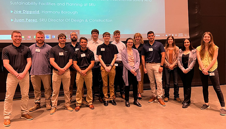 Students outside presenting