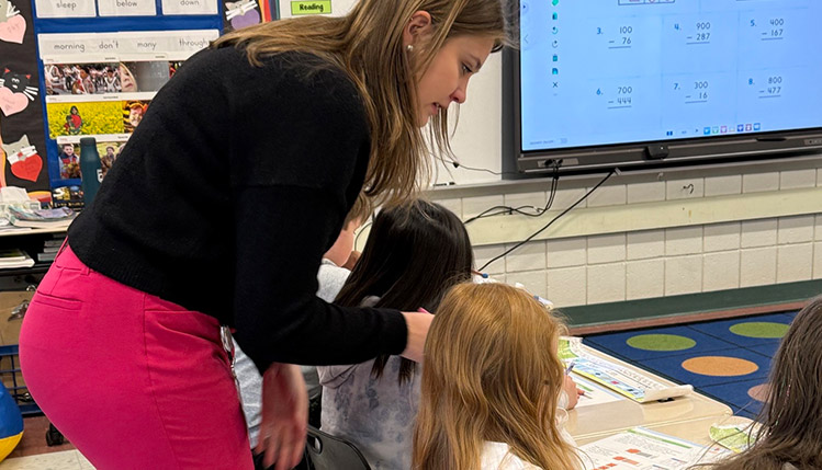 Student teaching children