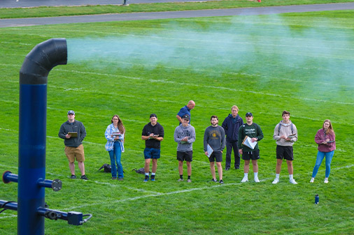 Students reading smoke