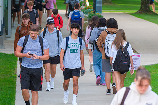 Students and professors entering commencement