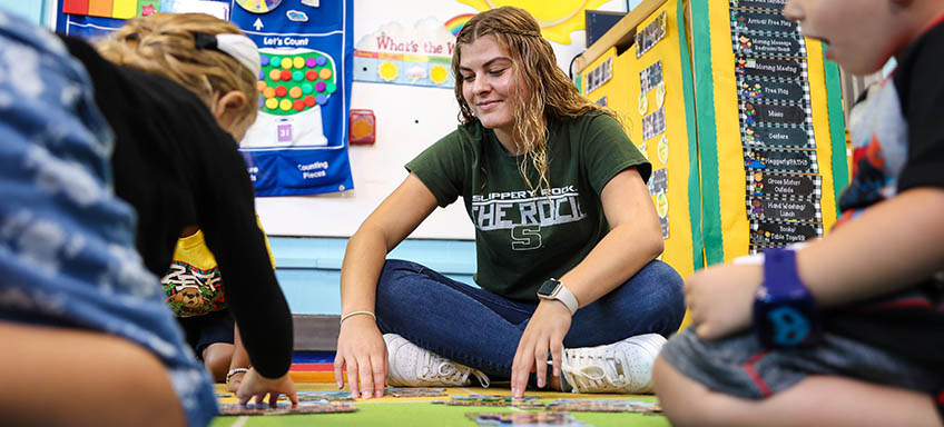 Student working with students