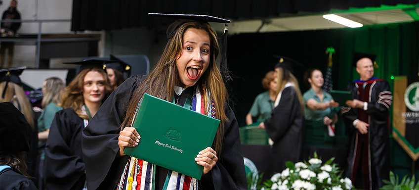 Student celebrating graduation
