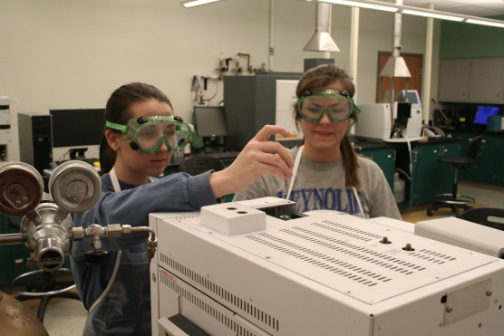 Instrumental Analysis students working in a lab