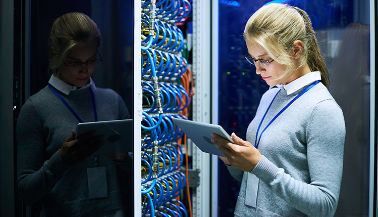 Woman working on a server