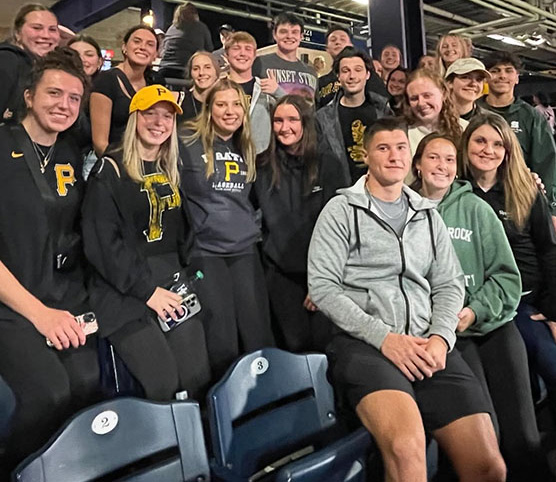 Exercise Science Society group at a baseball game