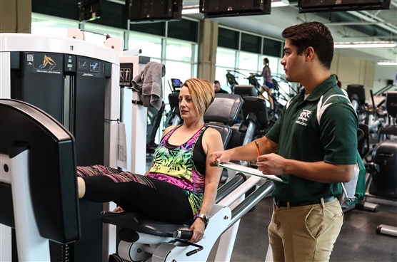 woman on exercise machine