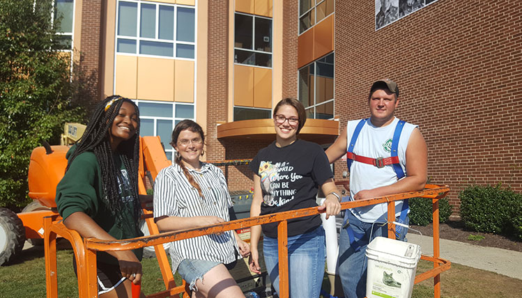 students on lift