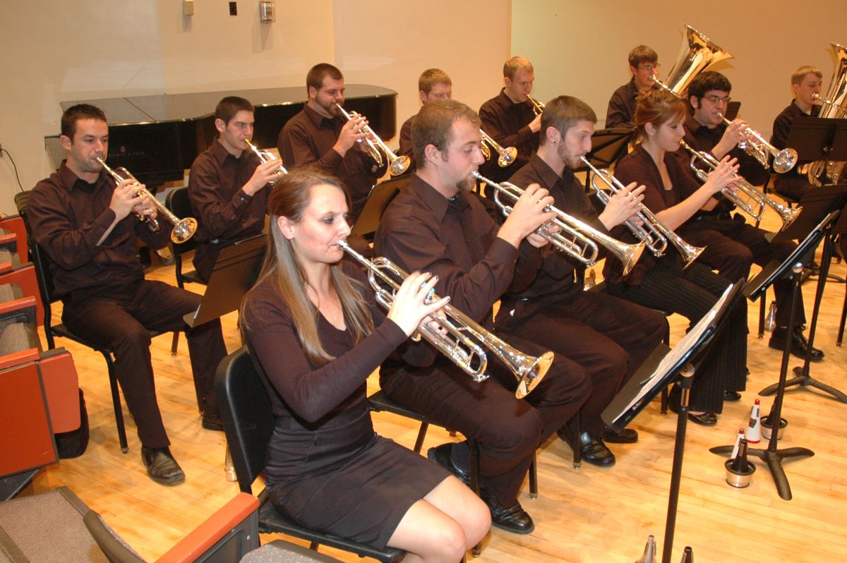 Students performing on trumpets and tubas