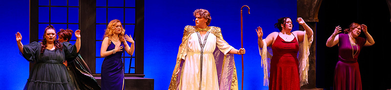 Students performing on a stage
