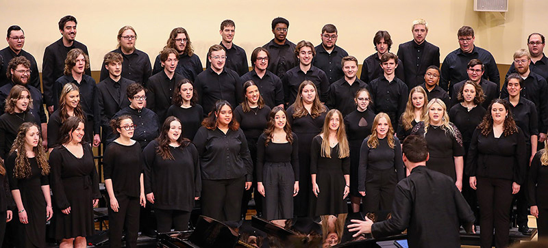 A choir singing vibrantly.