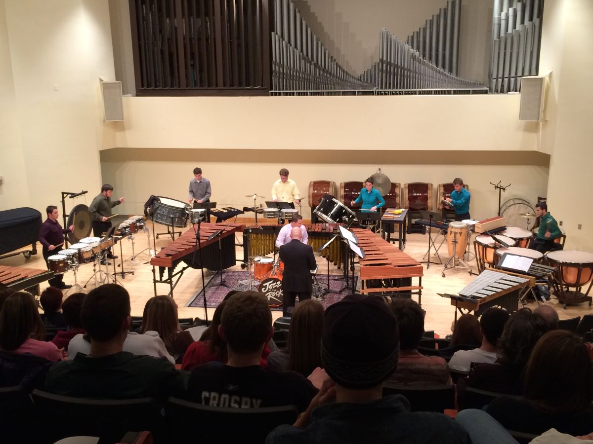 Student group performing on percussion instruments