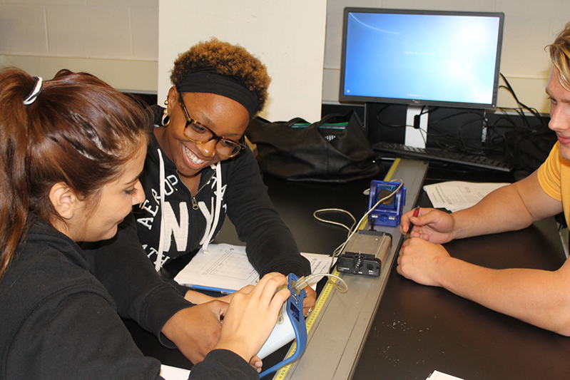 Students working with lab equipment