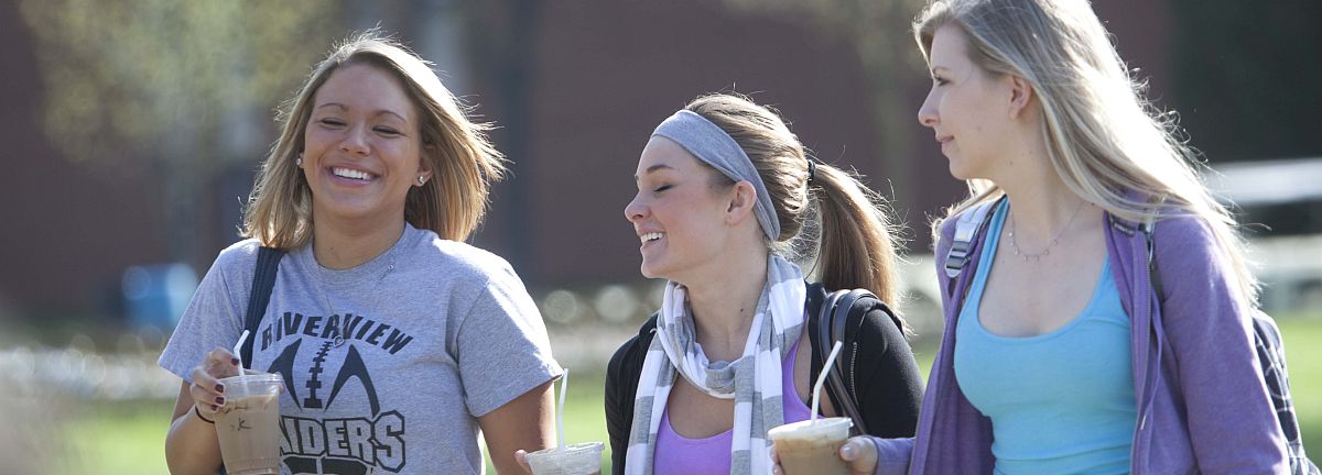 3 Students walking