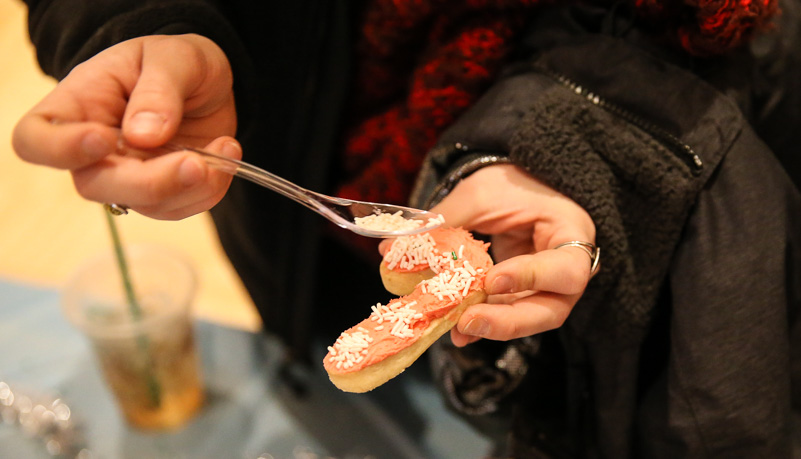 A cookie being decorated