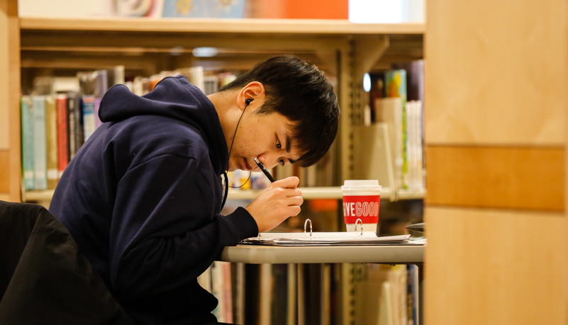 Man doing classwork