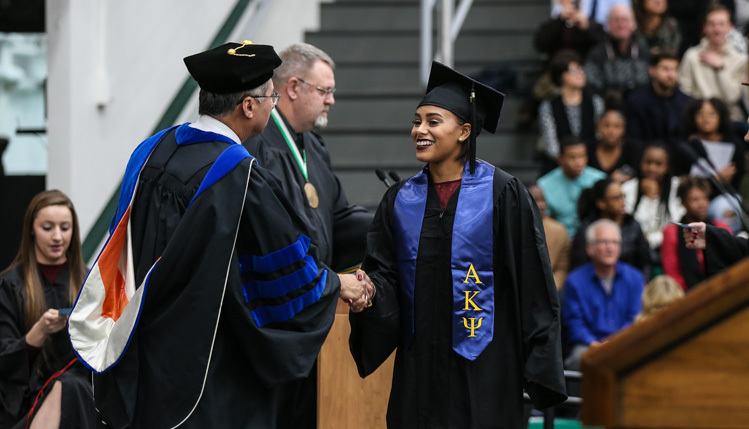 Graduate recieves her diploma