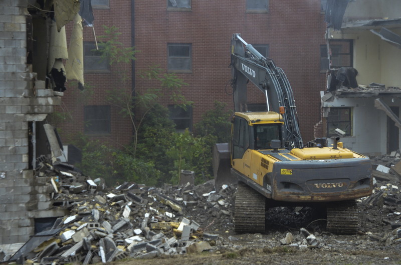 Construction machine demolishing Kraus