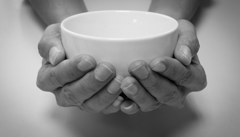 Hands cupping bowl