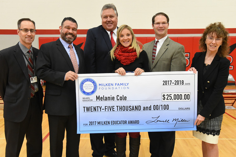 Melanie Cole accepts teaching award