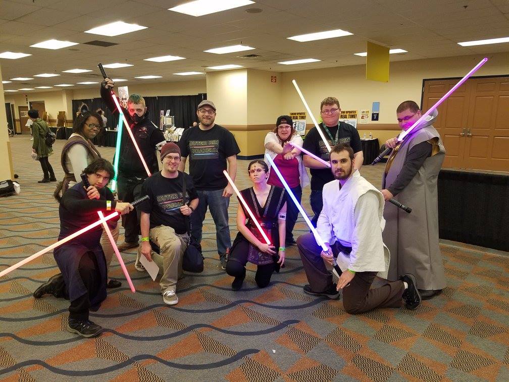 Cosplayers with lightsabers