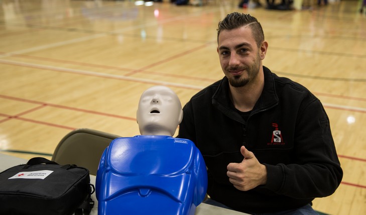 cpr dummy and a thumbs up