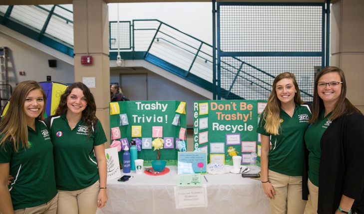 recycling booth with students