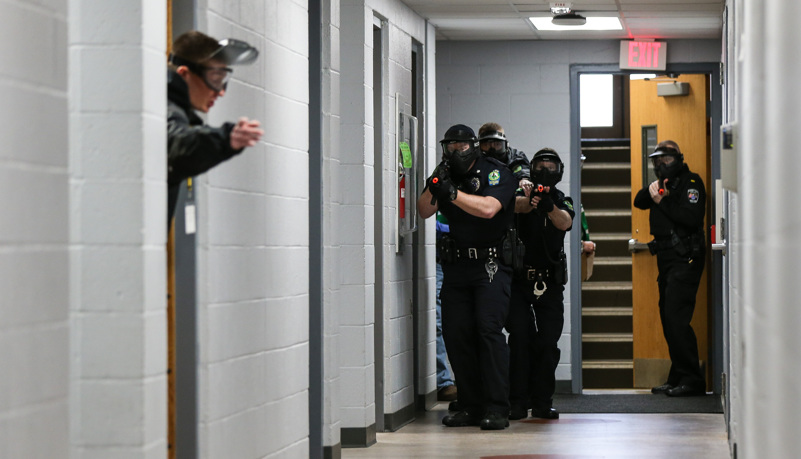 Police clear a hall