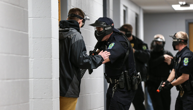 Police clear a hall