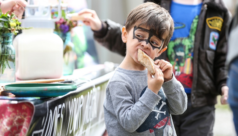 Boy eating bread