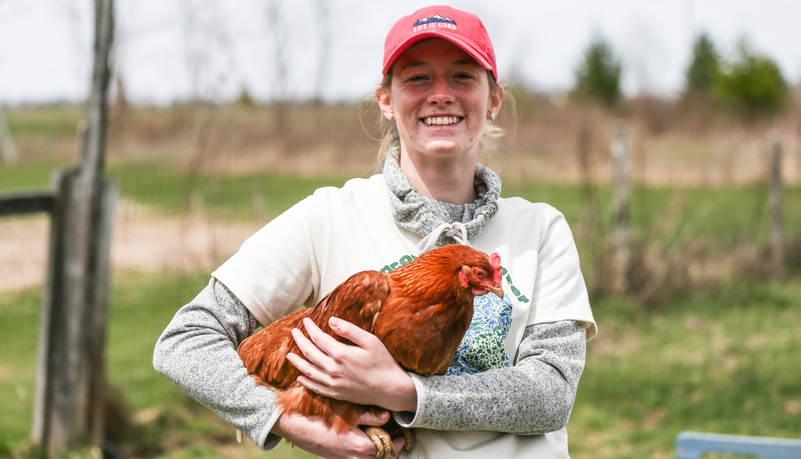 Student with a chicken