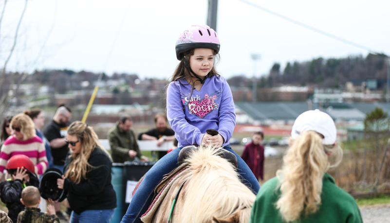 Girl riding a horse