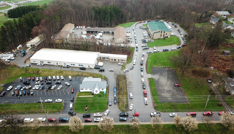 Cars lined up around the building